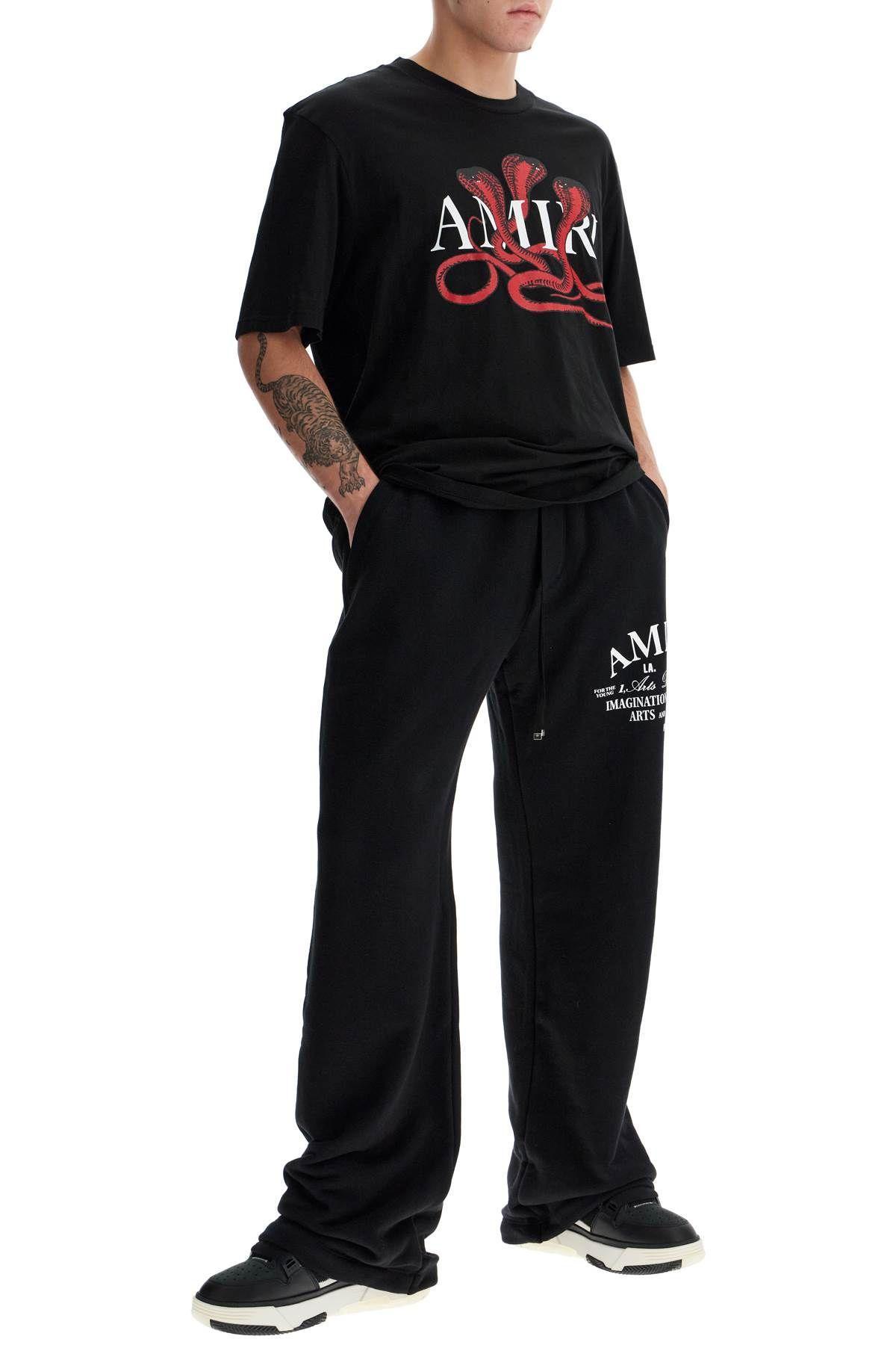 AMIRI Logo-print Cotton Track Pants In Black Product Image