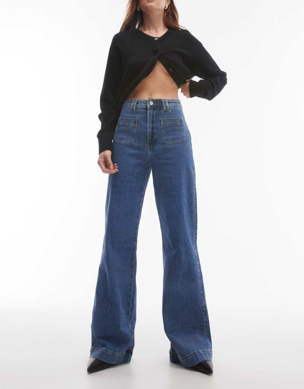 & Other Stories high rise flared jeans with patch pockets in mid blue wash product image