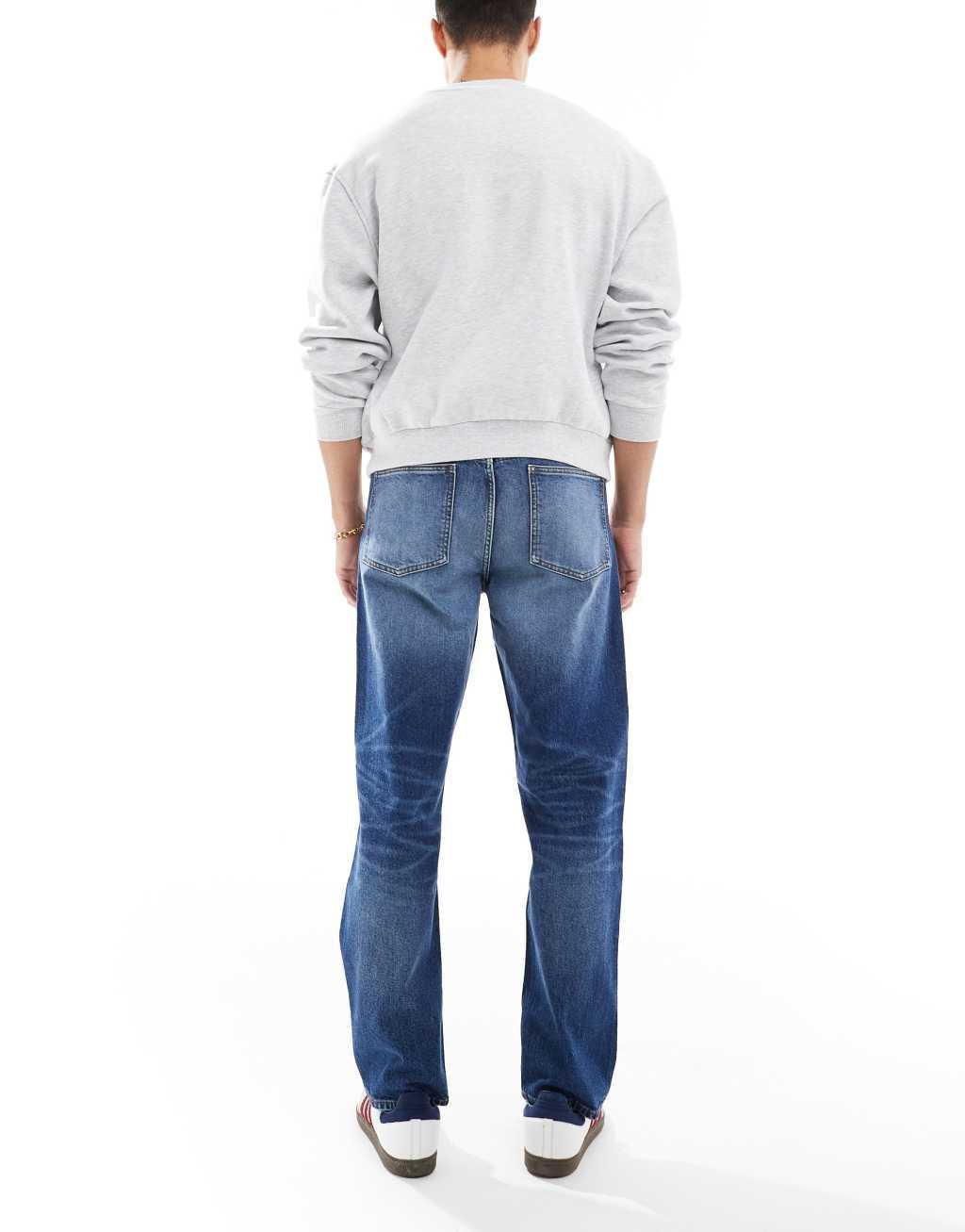 ASOS DESIGN straight stretch jeans in mid blue wash Product Image