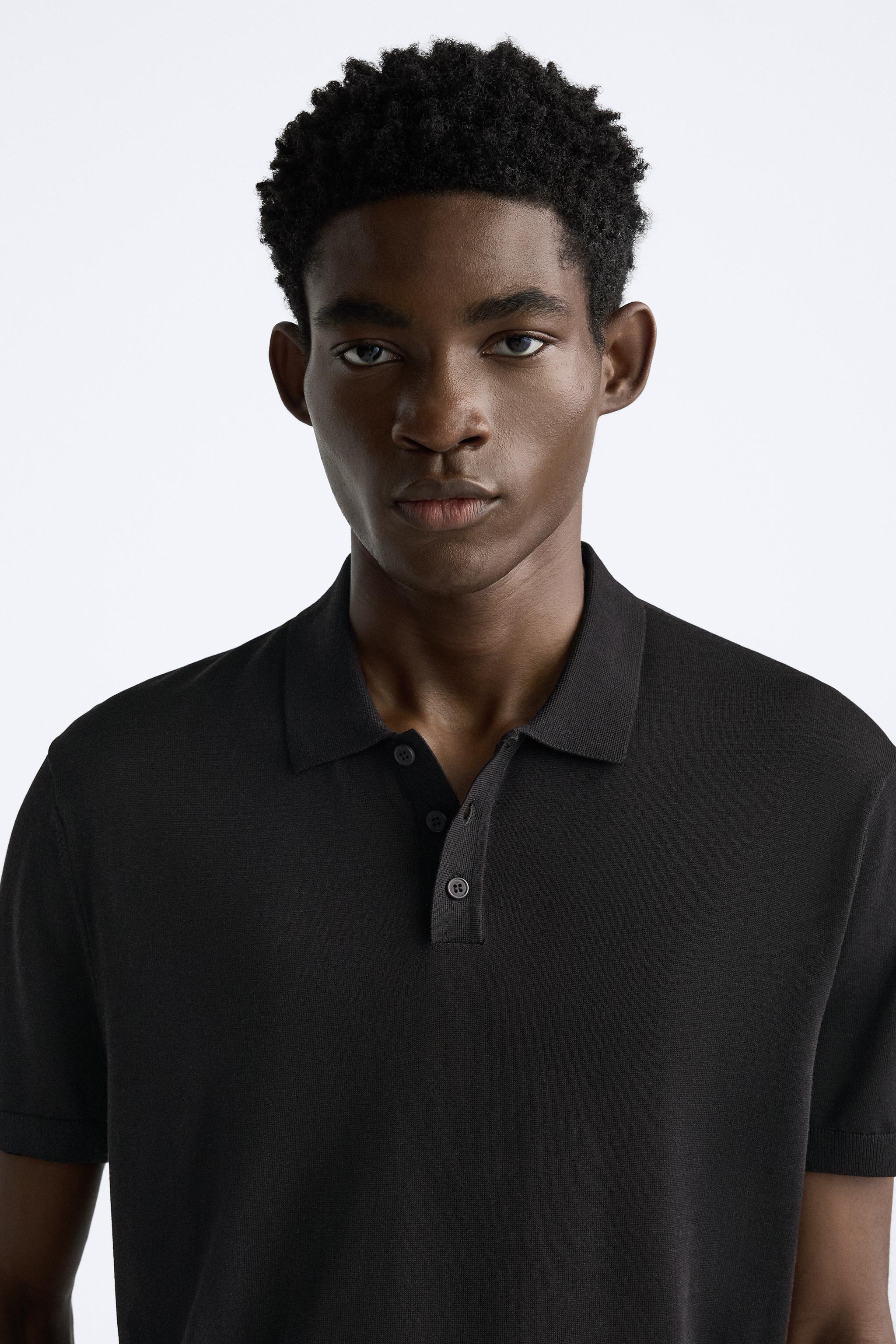 Cotton and silk blend polo shirt. Lapel collar with front button closure and short sleeves. Rib trim. Product Image