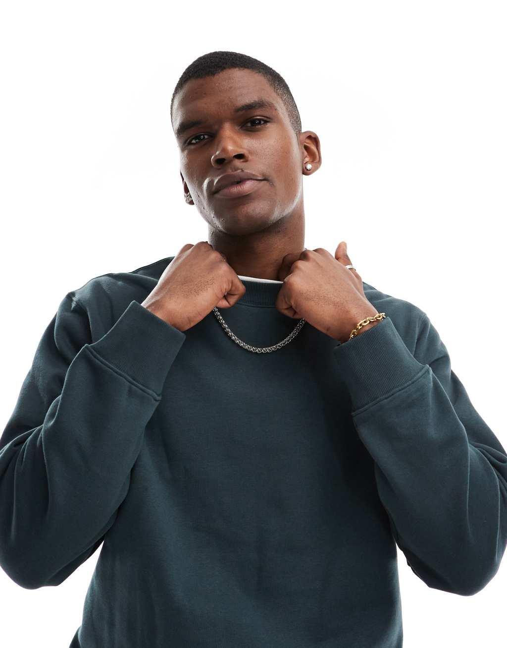 Jack & Jones oversized heavy weight crew neck sweatshirt in dark green Product Image