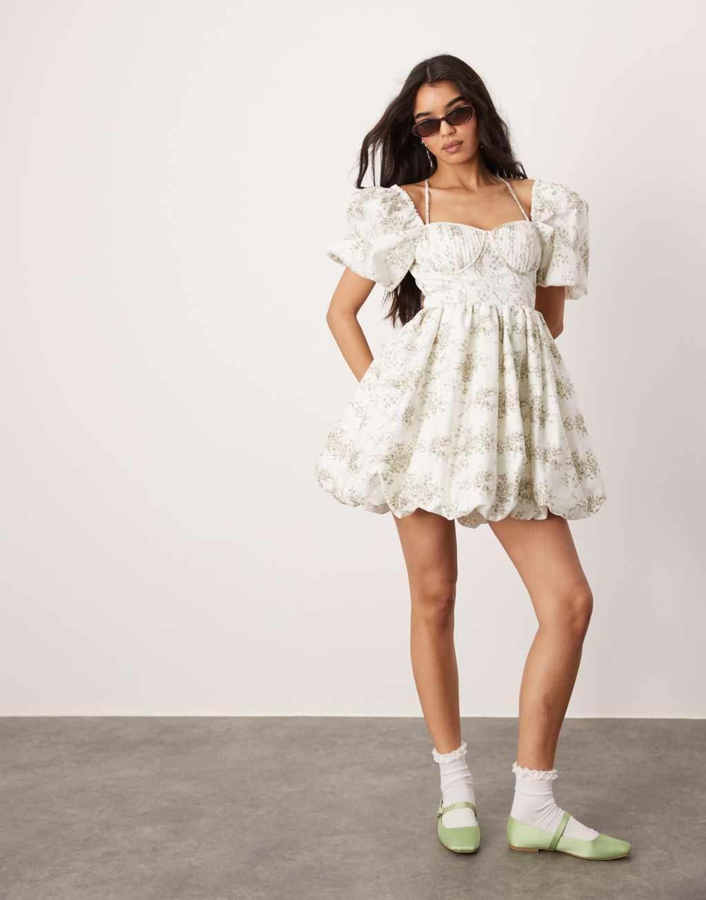 ASOS DESIGN bubble mini dress with pintuck corset bodice in bow floral print Product Image