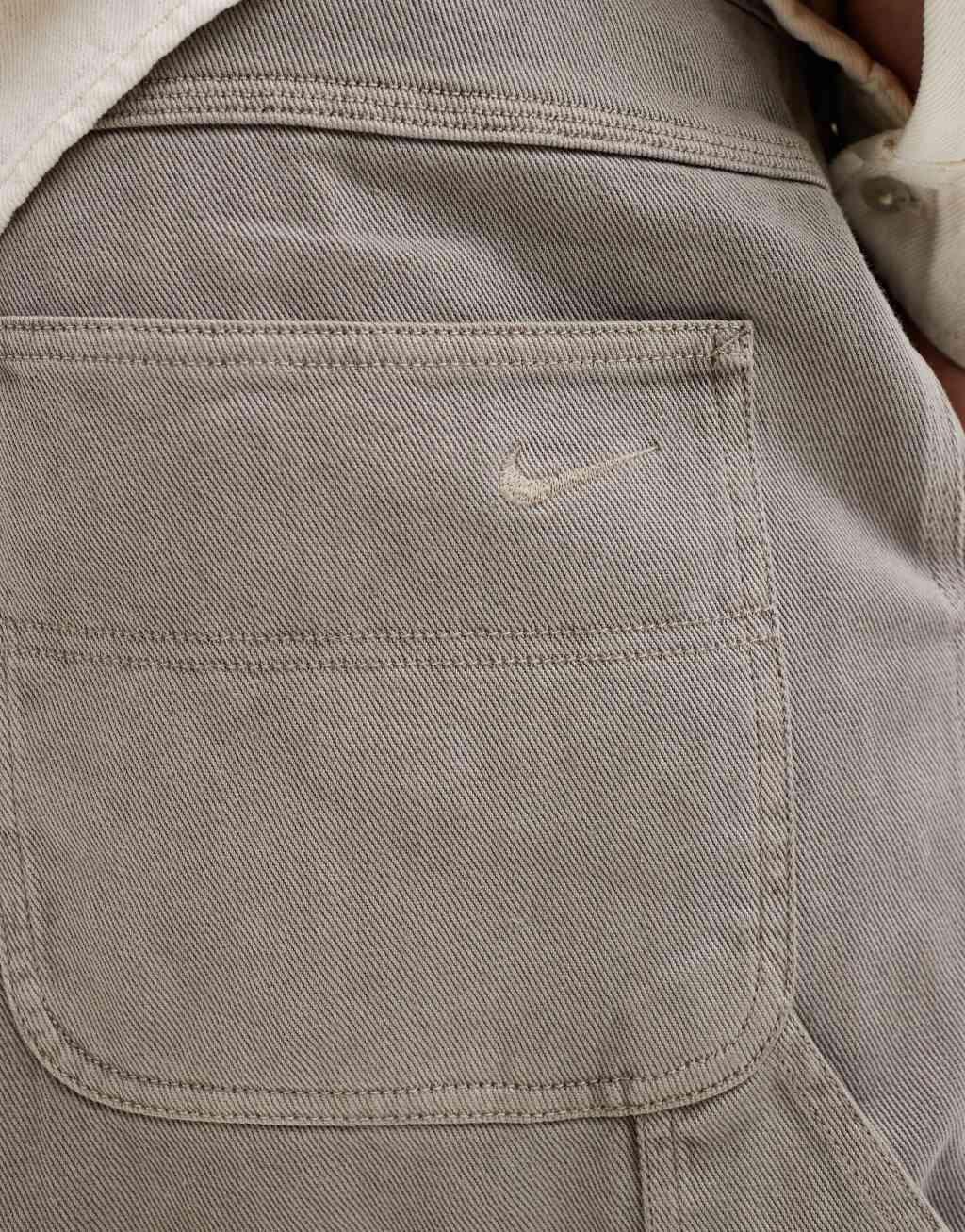 Nike carpenter pants in light gray Product Image