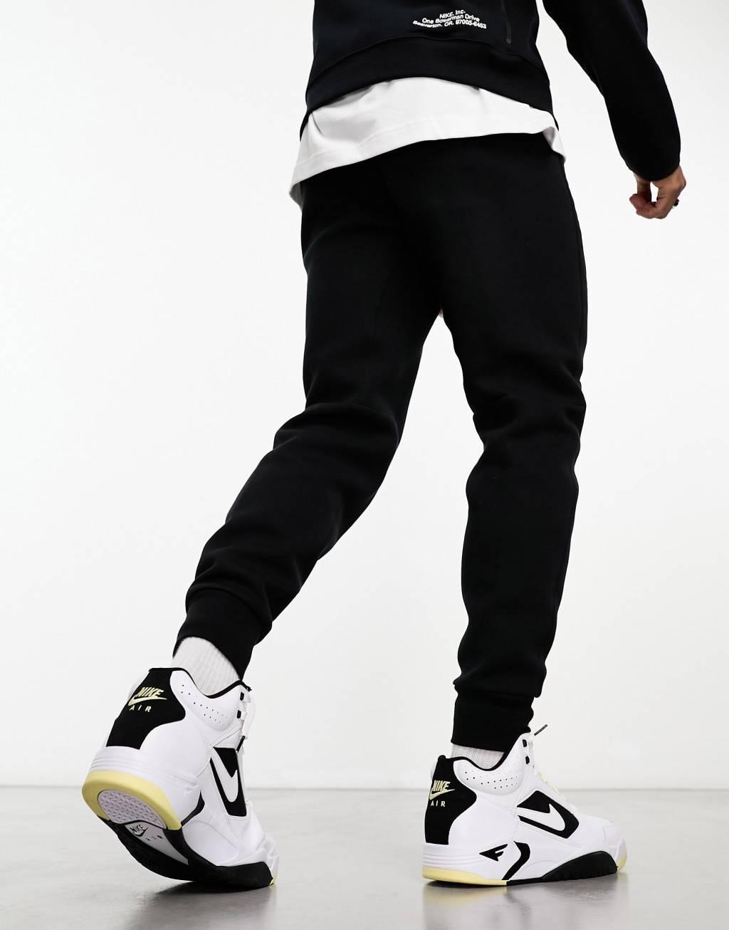 Nike Tech Fleece joggers in black Product Image