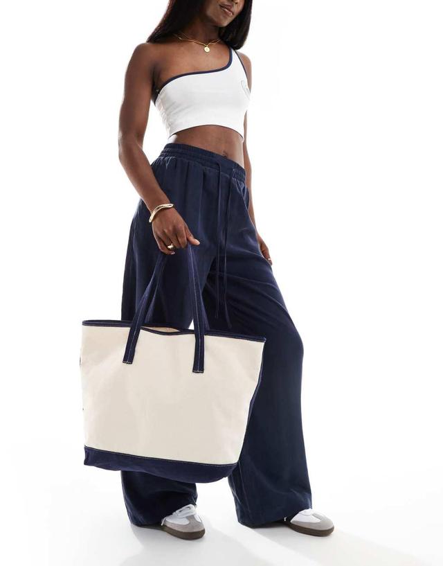 ASOS DESIGN canvas tote bag with contrast detail in navy blue Product Image