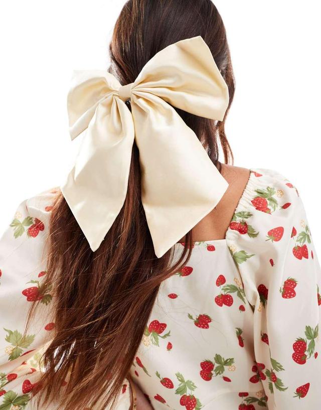 ASOS DESIGN hair clip with oversized bow in cream Product Image