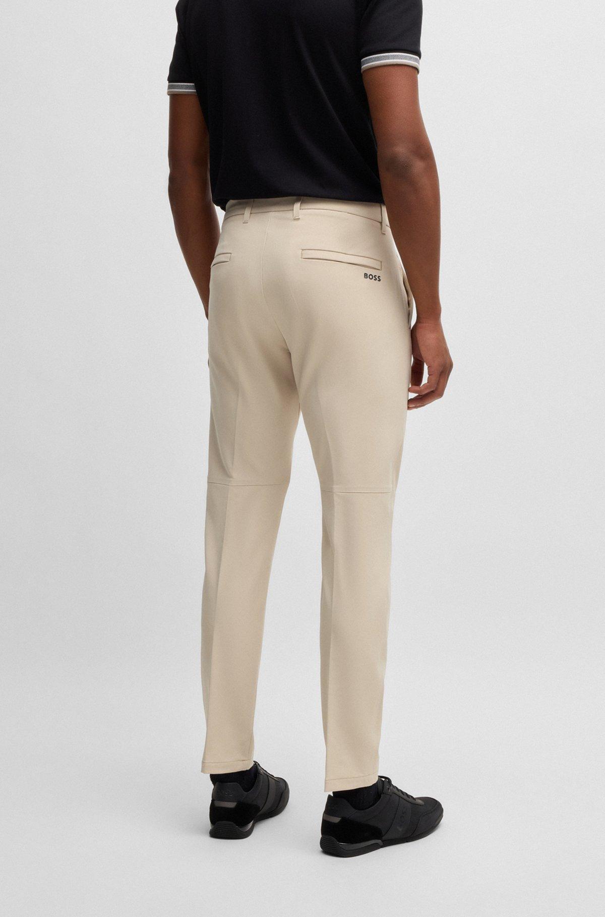 Slim-fit trousers in water-repellent stretch fabric Product Image