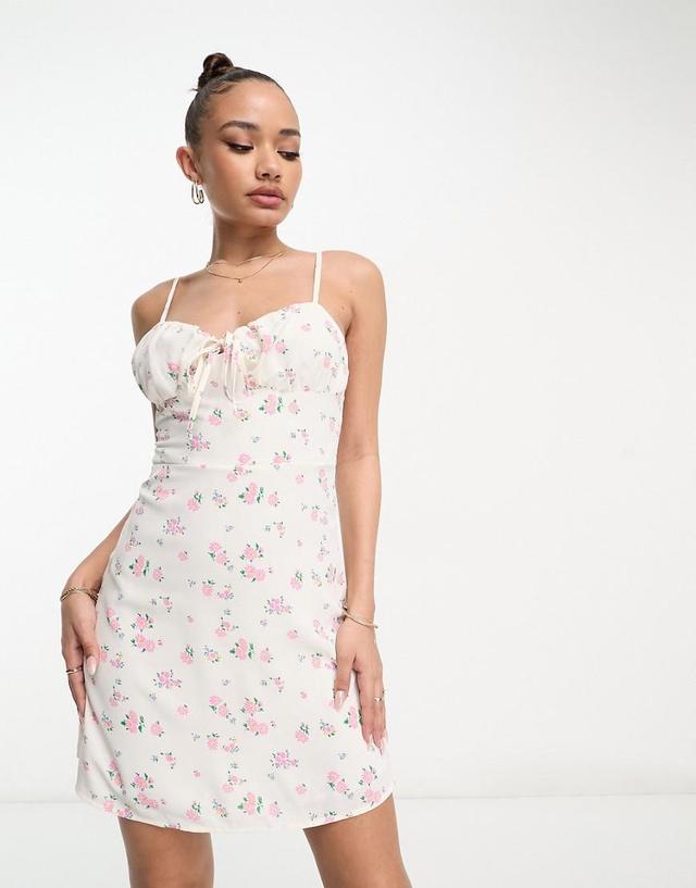 Collective the Label ruched bust mini dress in mixed floral Product Image