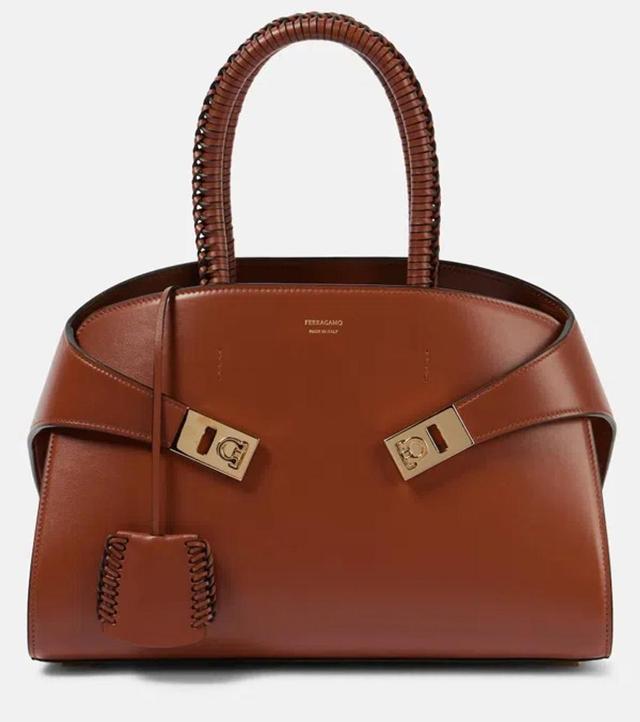 Hug Medium Leather Tote Bag In Brown Product Image