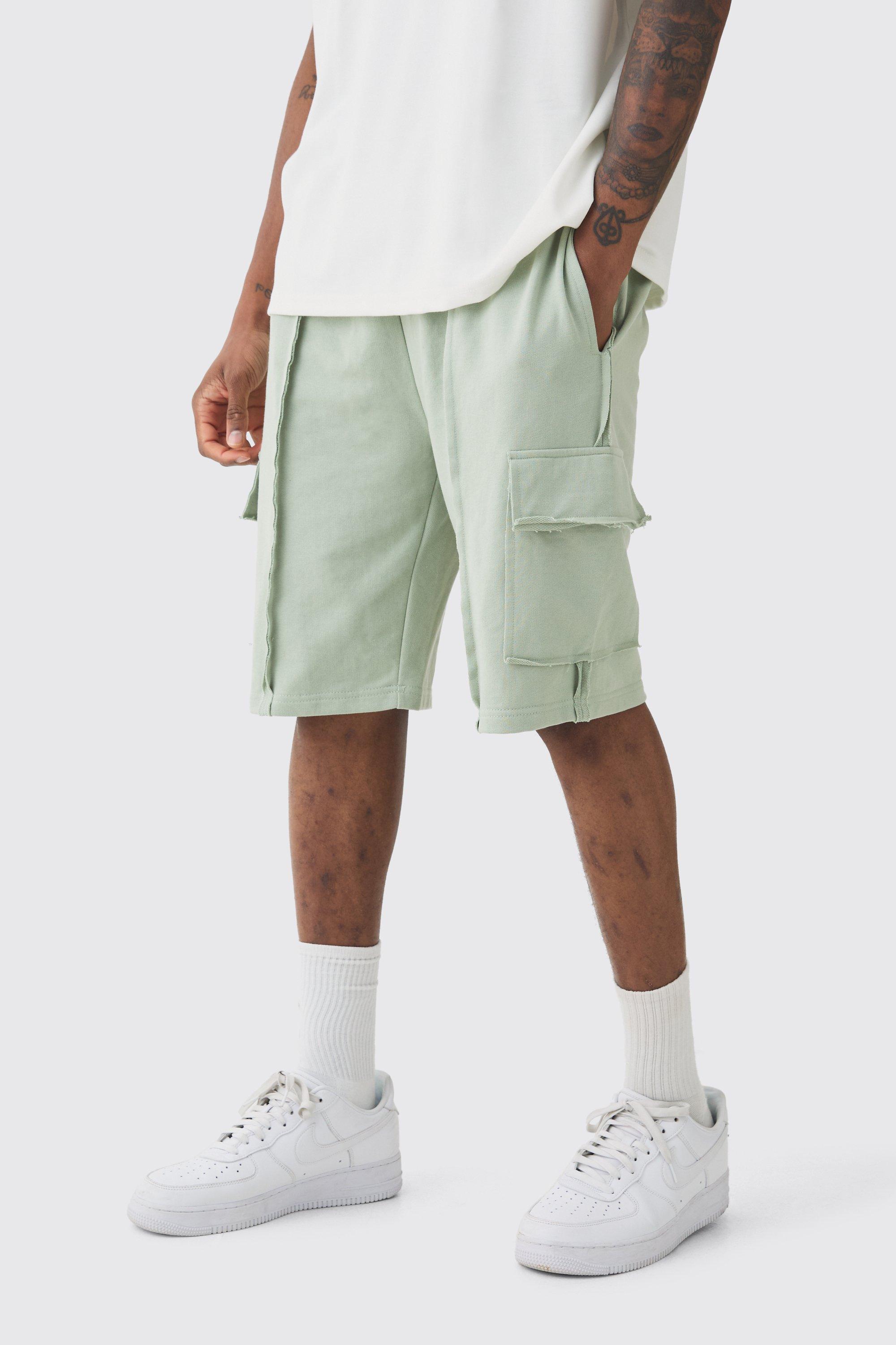 Tall Loose Fit Raw Interlock Seam Cargo Jersey Short | boohooMAN USA Product Image