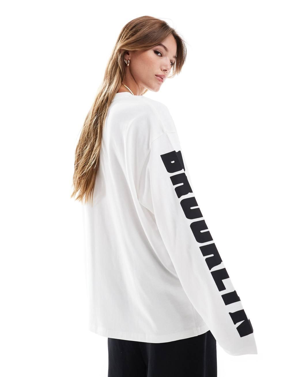 ASOS DESIGN long sleeve skater top with brooklyn graphic in white Product Image