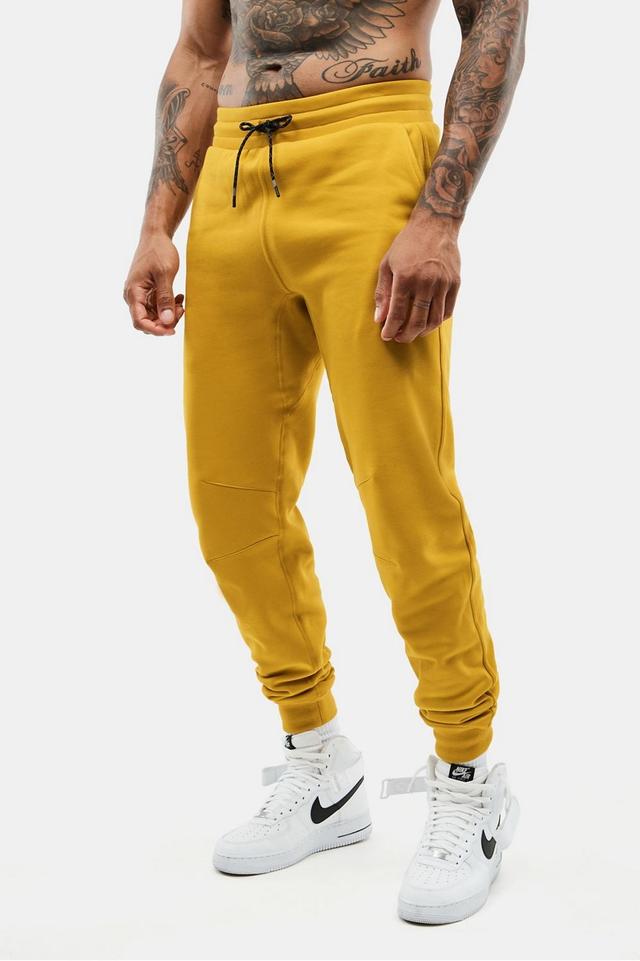 Fabletics Men The Postgame Jogger male Mustard Size M Product Image