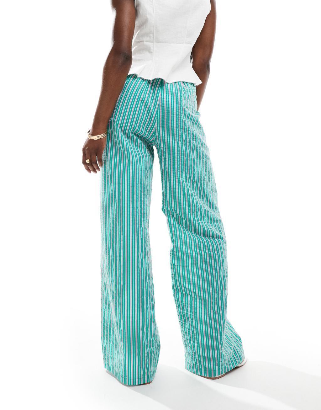 ASOS DESIGN seersucker tie waist wide leg pants in green & pink stripe Product Image