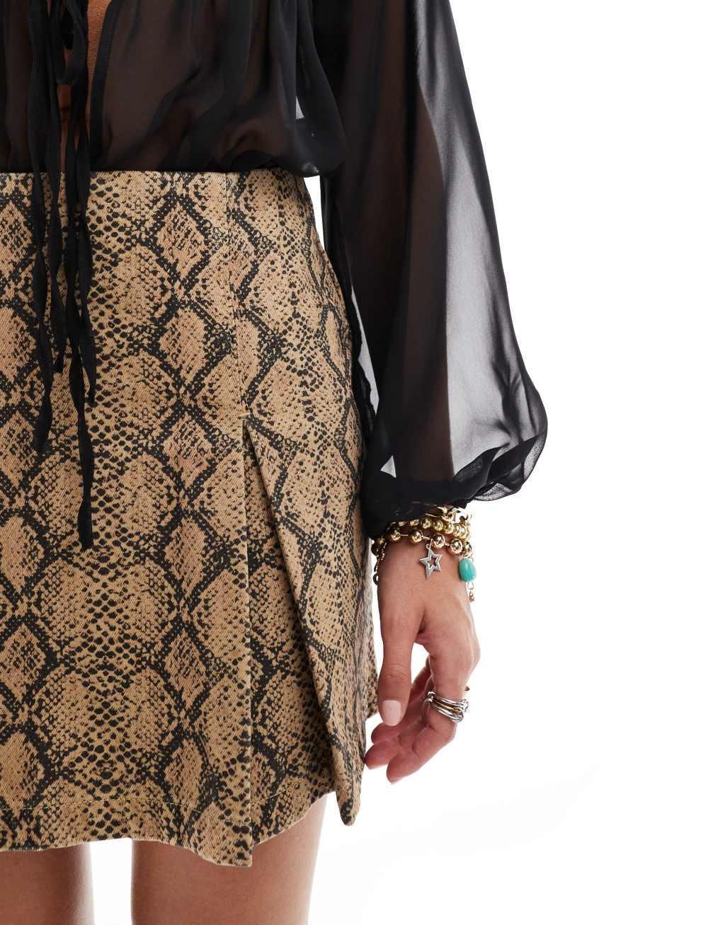 ASOS DESIGN denim pleated skirt in snake print Product Image