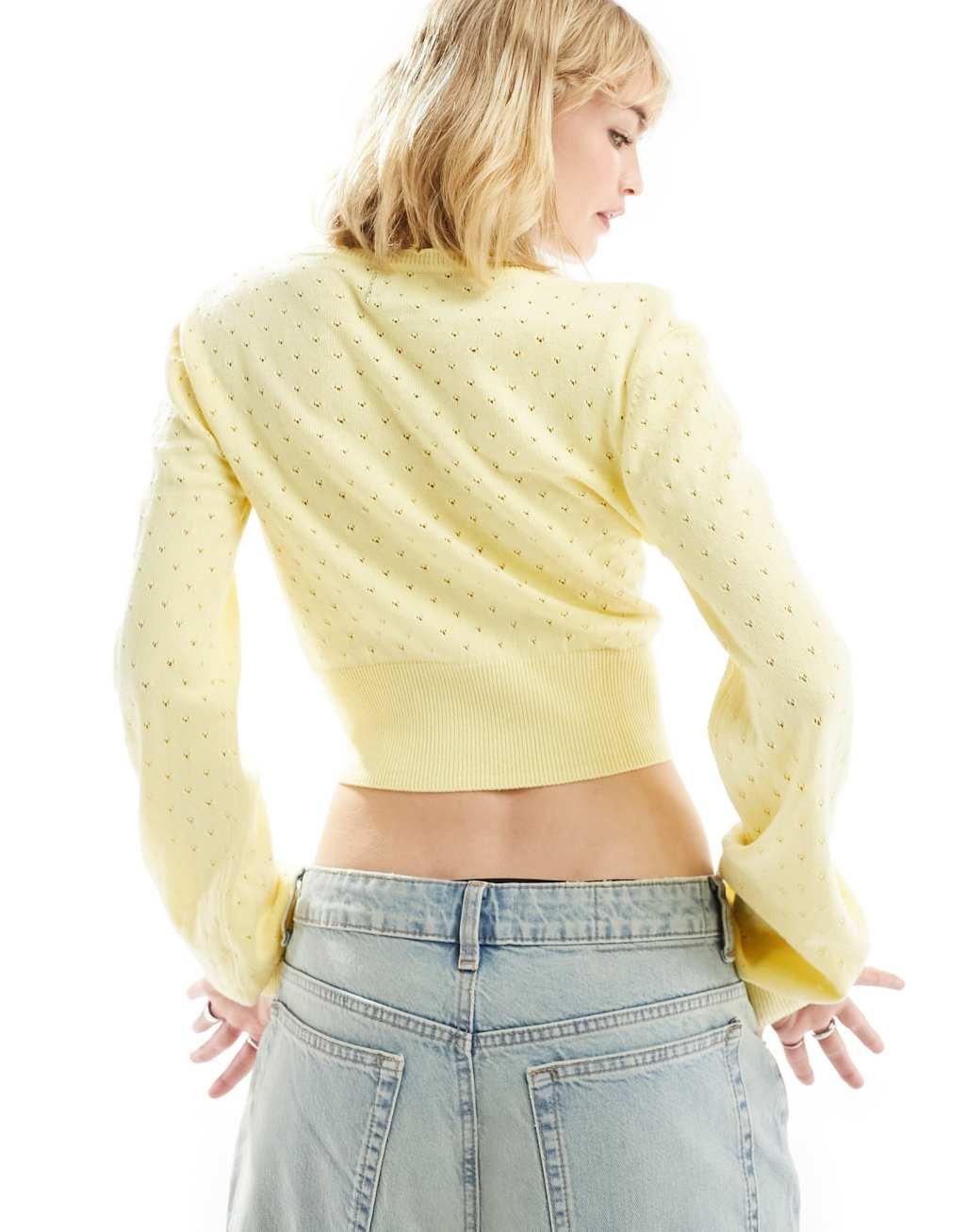 ASOS DESIGN knit long sleeve top in pointelle stitch with contrast bow detail in lemon Product Image