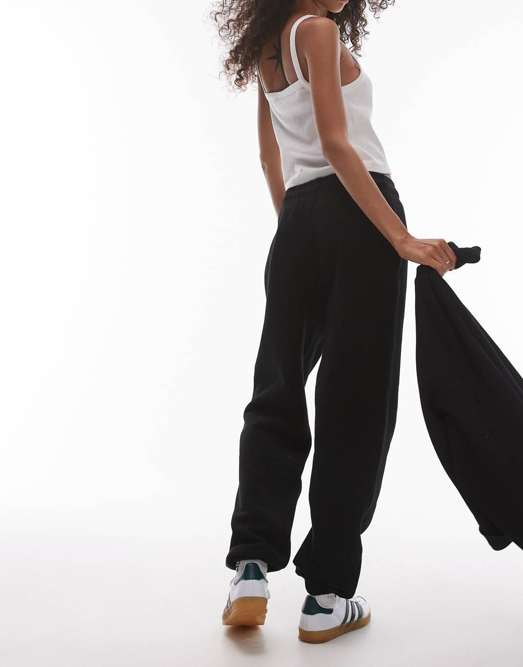 Topshop cuffed sweatpants in black Product Image