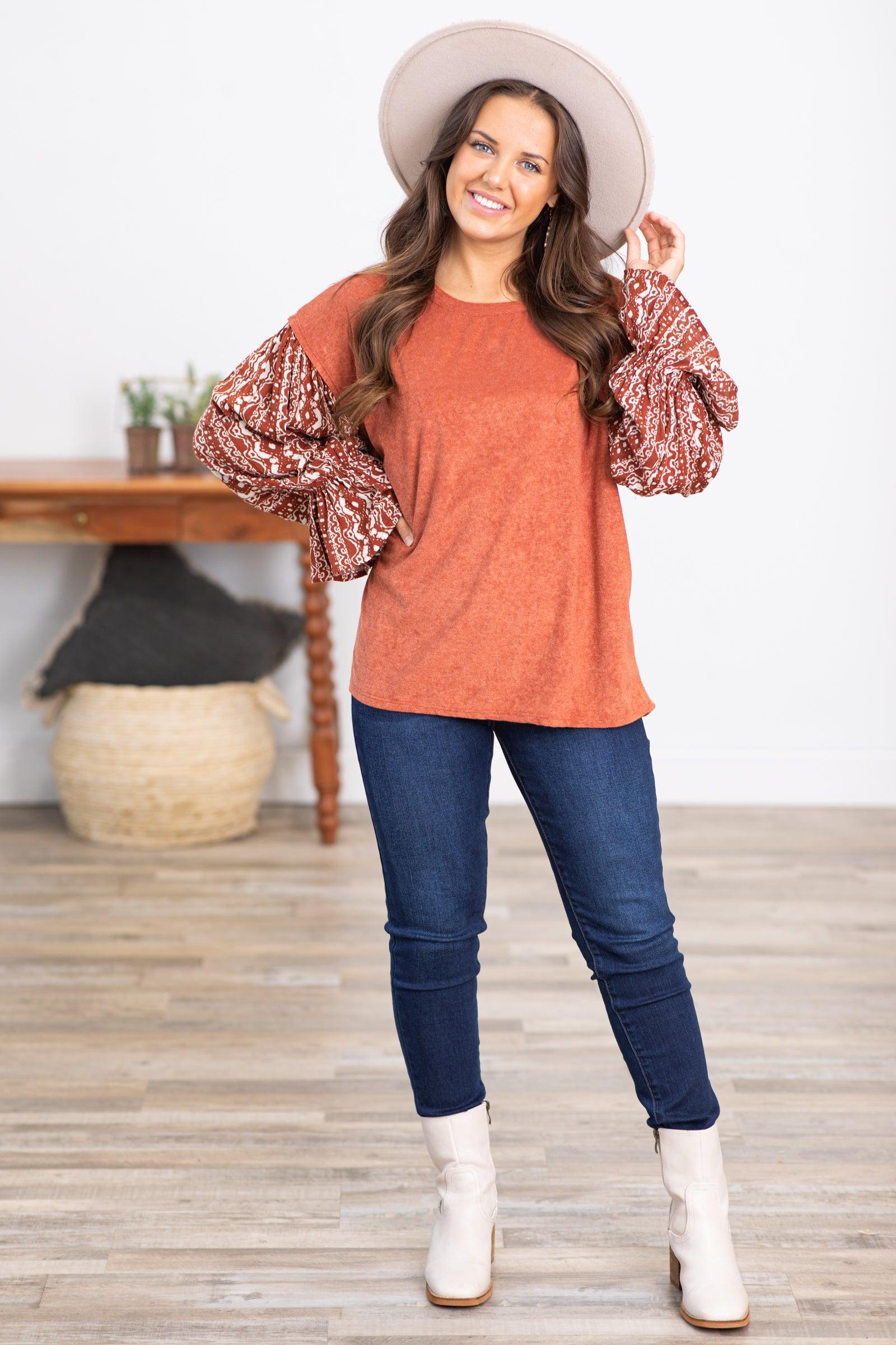 Rust Top With Aztec Print Balloon Sleeves Product Image