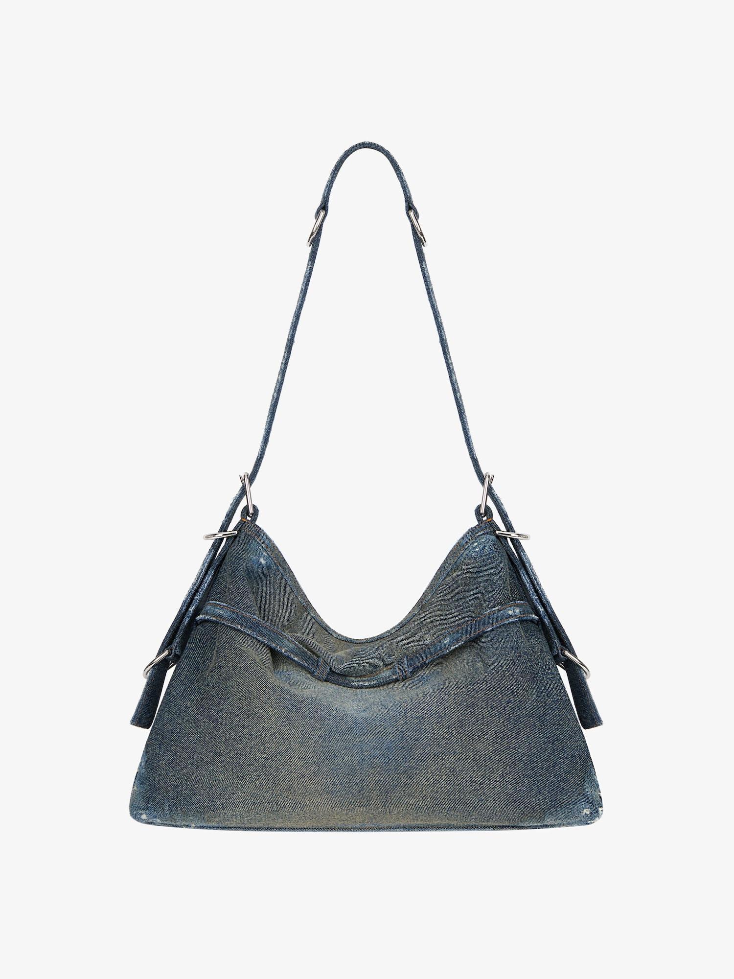 Medium Voyou bag in washed denim Product Image