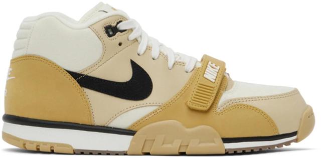 Air Trainer 1 Sneakers Coconut Milk In Coconut Milk/black/team Gold/sail-wheat-gum Dark Brown Product Image