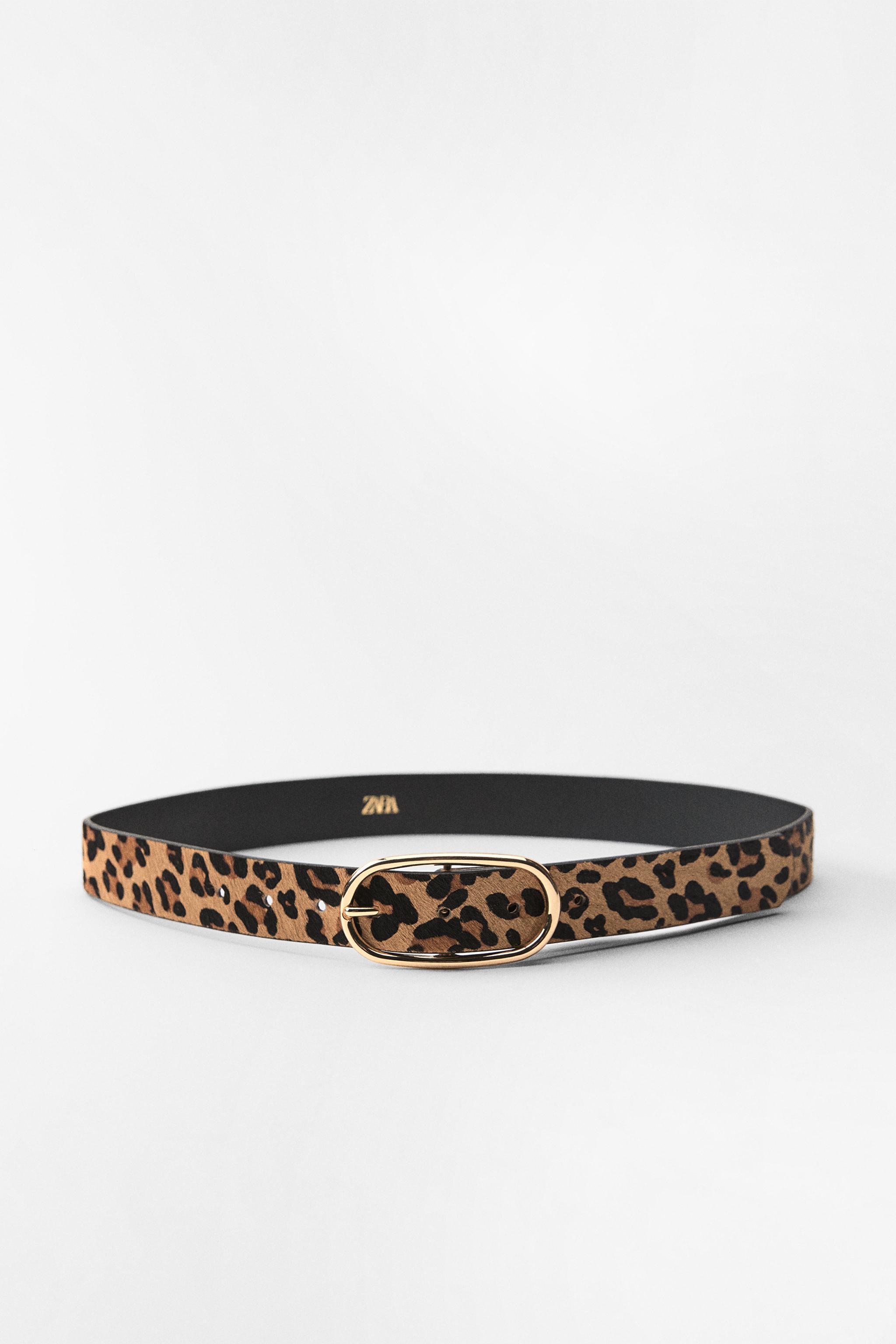 Belt made of printed leather with a width of 1.2 inches (3 cm). Oval metal buckle. Product Image