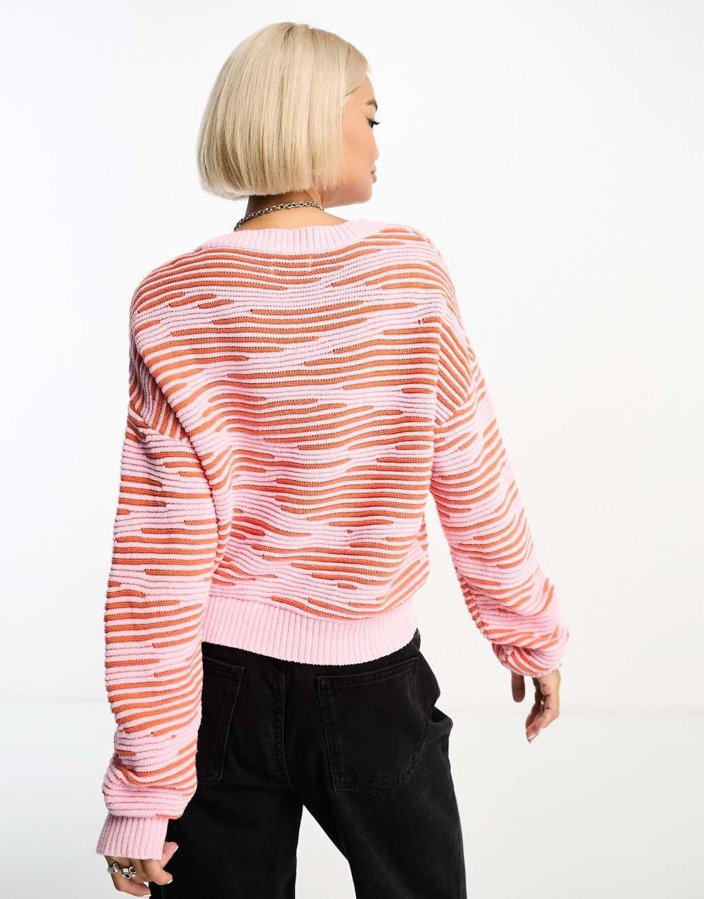 Only textured sweater in pink and orange print  Product Image