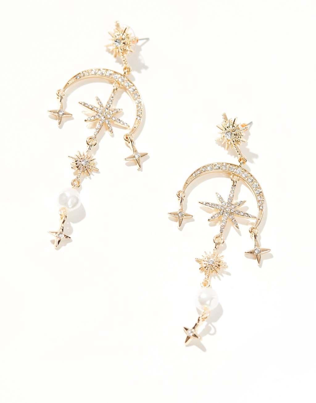 ASOS DESIGN drop earrings with celestial crystal and faux pearl detail in gold tone Product Image