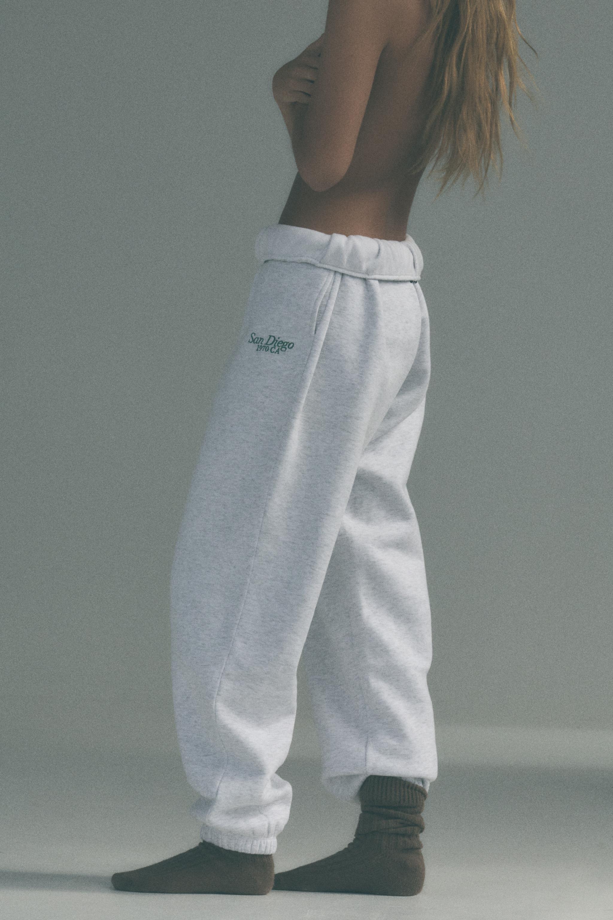 PLUSH TEXT JOGGER PANTS Product Image