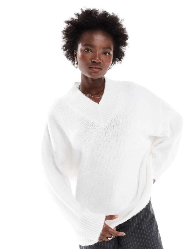 ASOS DESIGN v neck oversized sweater in fluffy yarn in cream Product Image