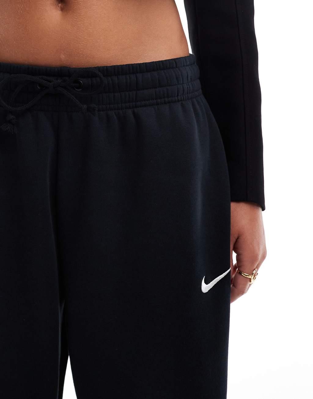 Nike Mini Swoosh sweatpants in black  Product Image