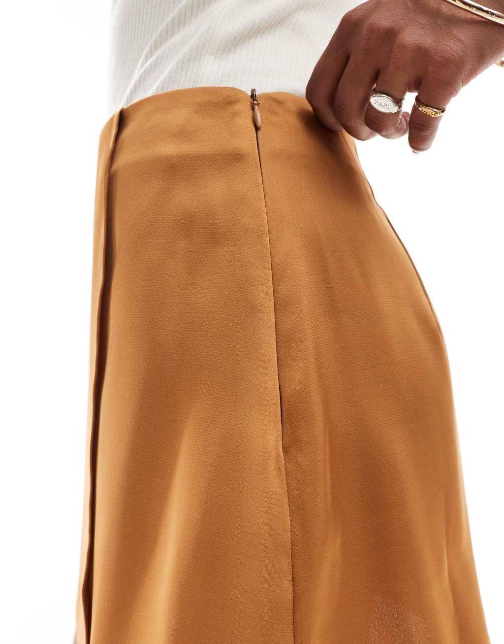 ASOS DESIGN Petite wrap satin skirt in gold Product Image