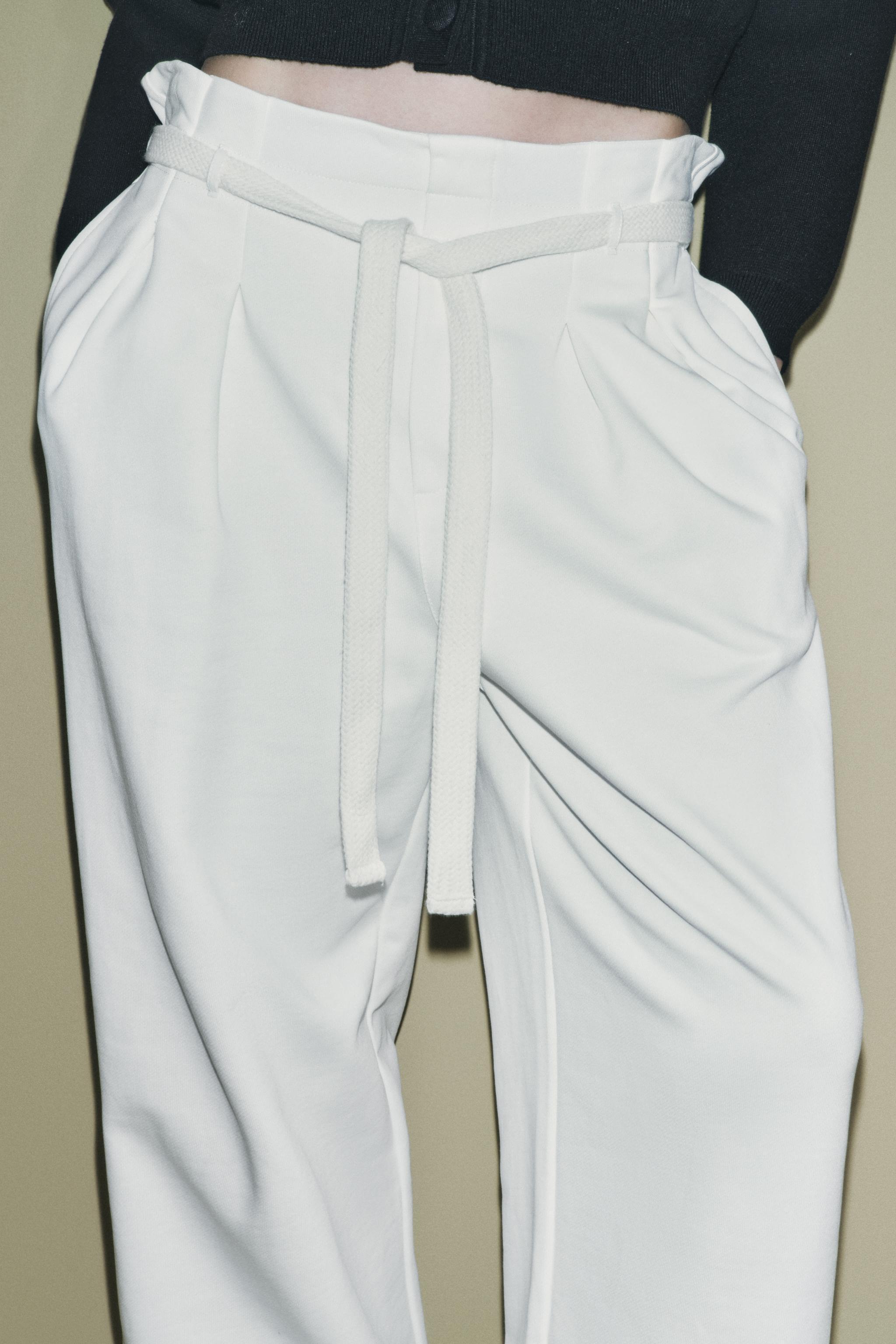 BELTED JOGGING PANTS Product Image