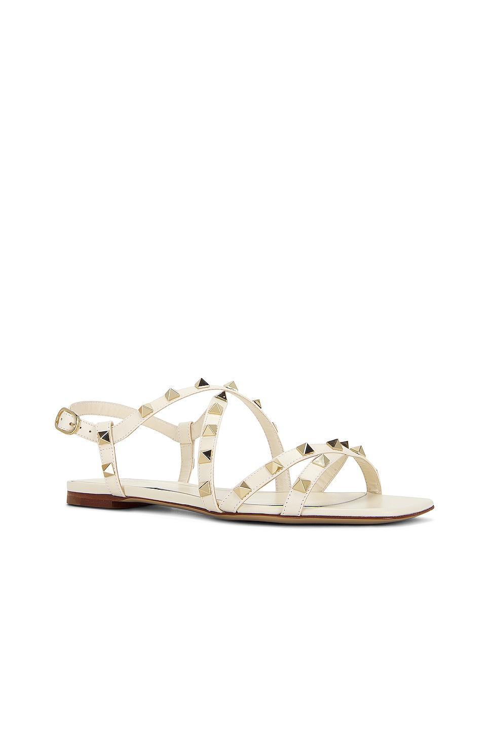 Valentino Garavani Rockstud Sandal in Light Ivory - Ivory. Size 36.5 (also in 36, 37.5, 39). Product Image