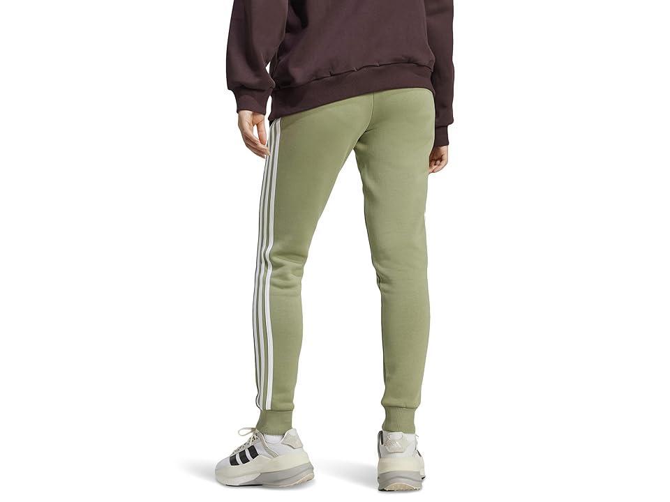 adidas Essentials 3-Stripes Fleece Pants (Tent Green) Women's Clothing Product Image