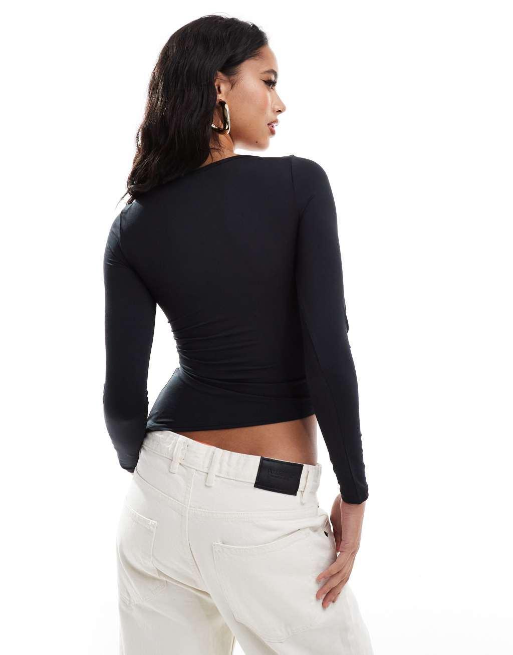 ASOS DESIGN slash neck long sleeve top with ruffle panel detail in black Product Image