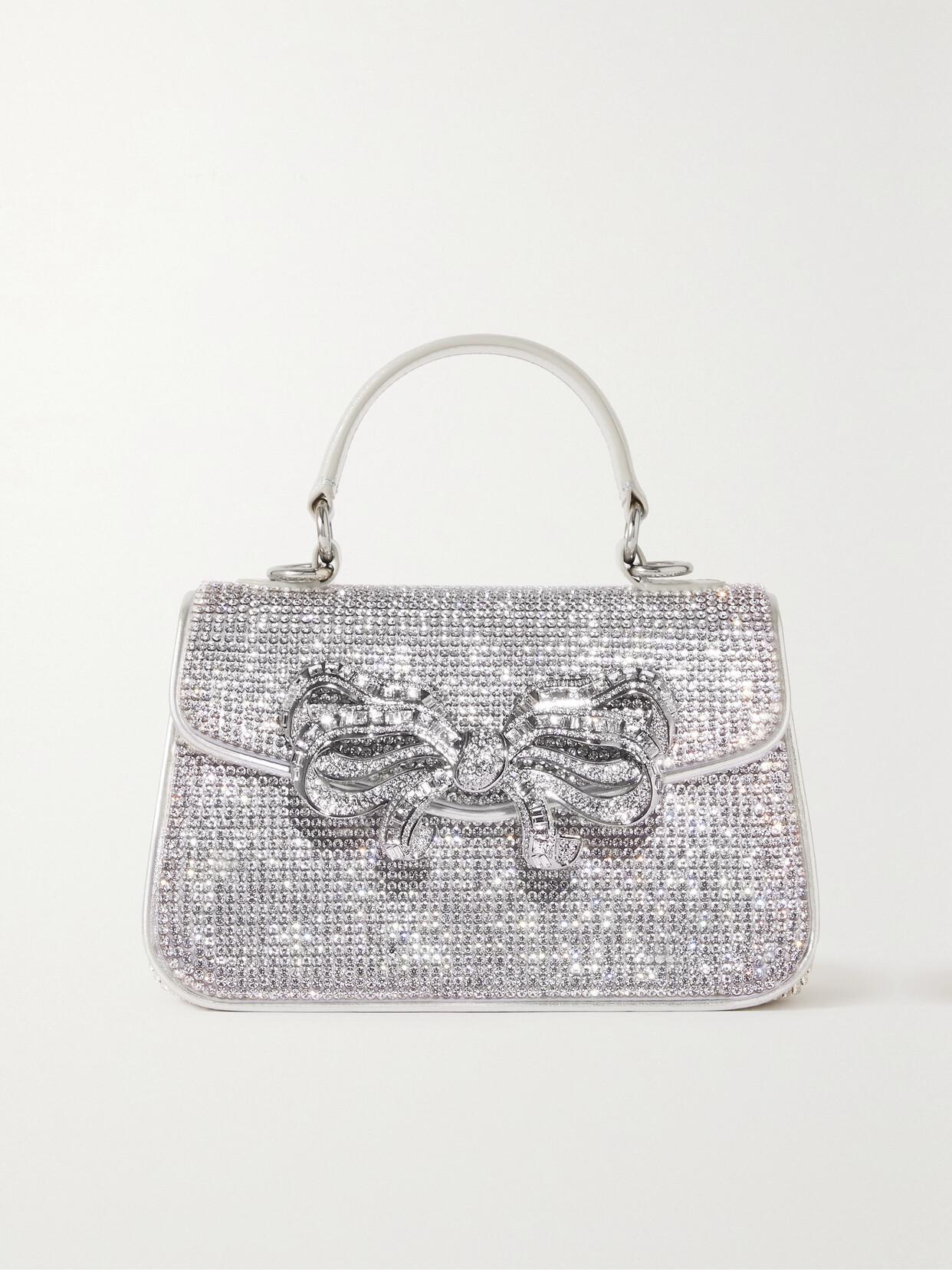 JUDITH LEIBER Mini Crystal-embellished Bow-detailed Metallic Leather Tote In Shine Silver Rhine Product Image