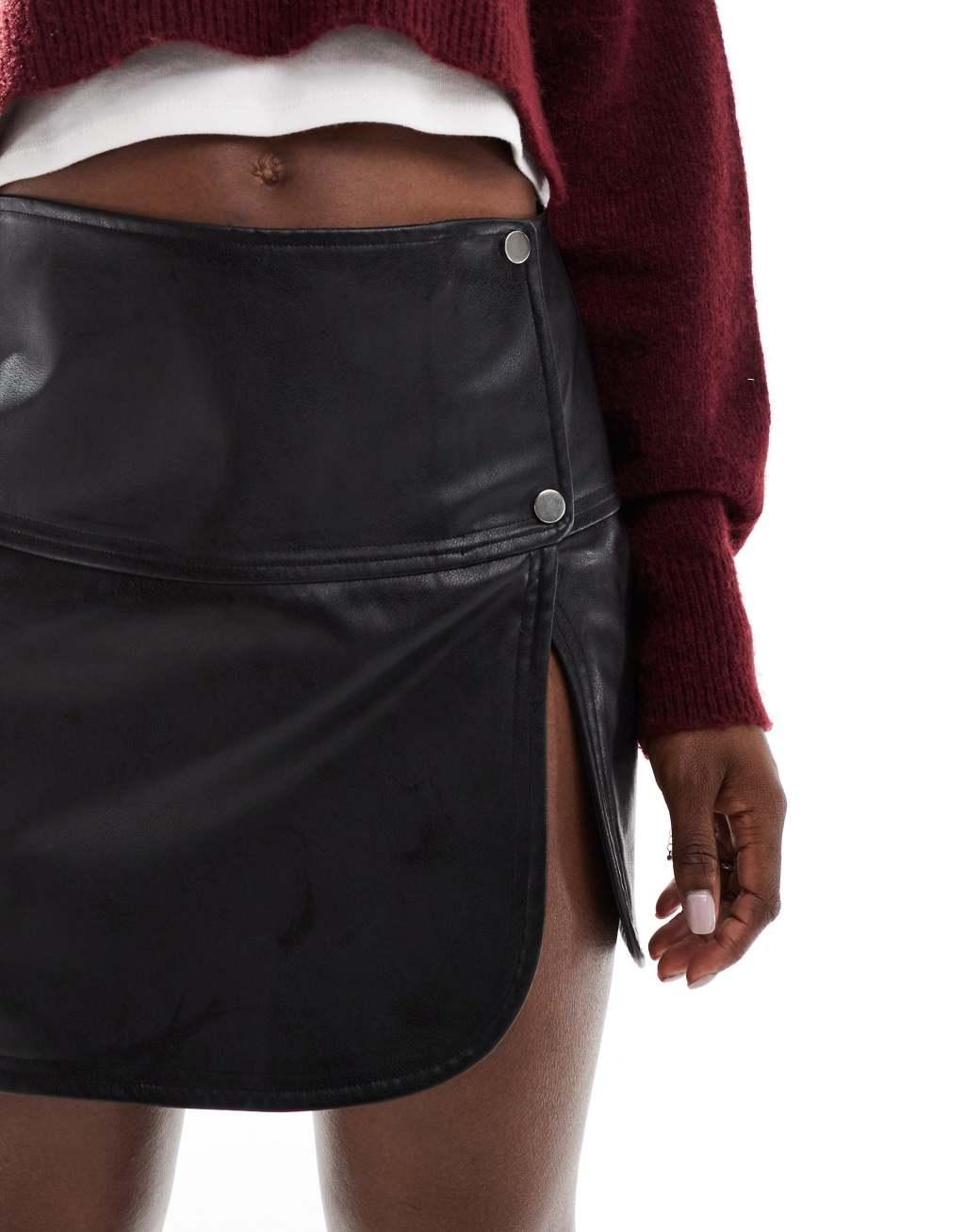 ASOS DESIGN snap detail leather look mini skirt in black Product Image