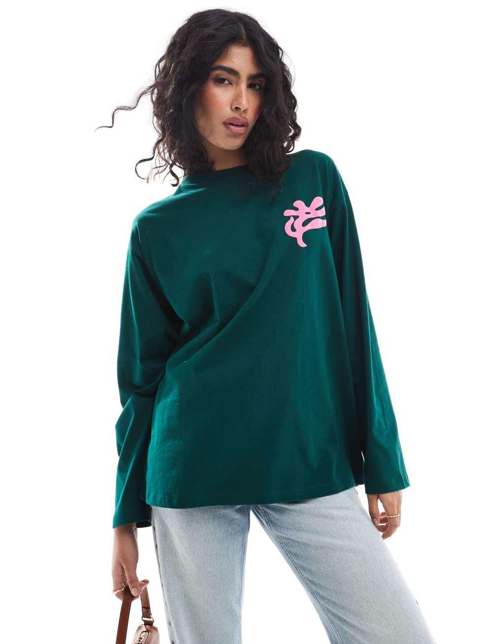 ASOS DESIGN long sleeve skater tee with flower paris graphic in green Product Image