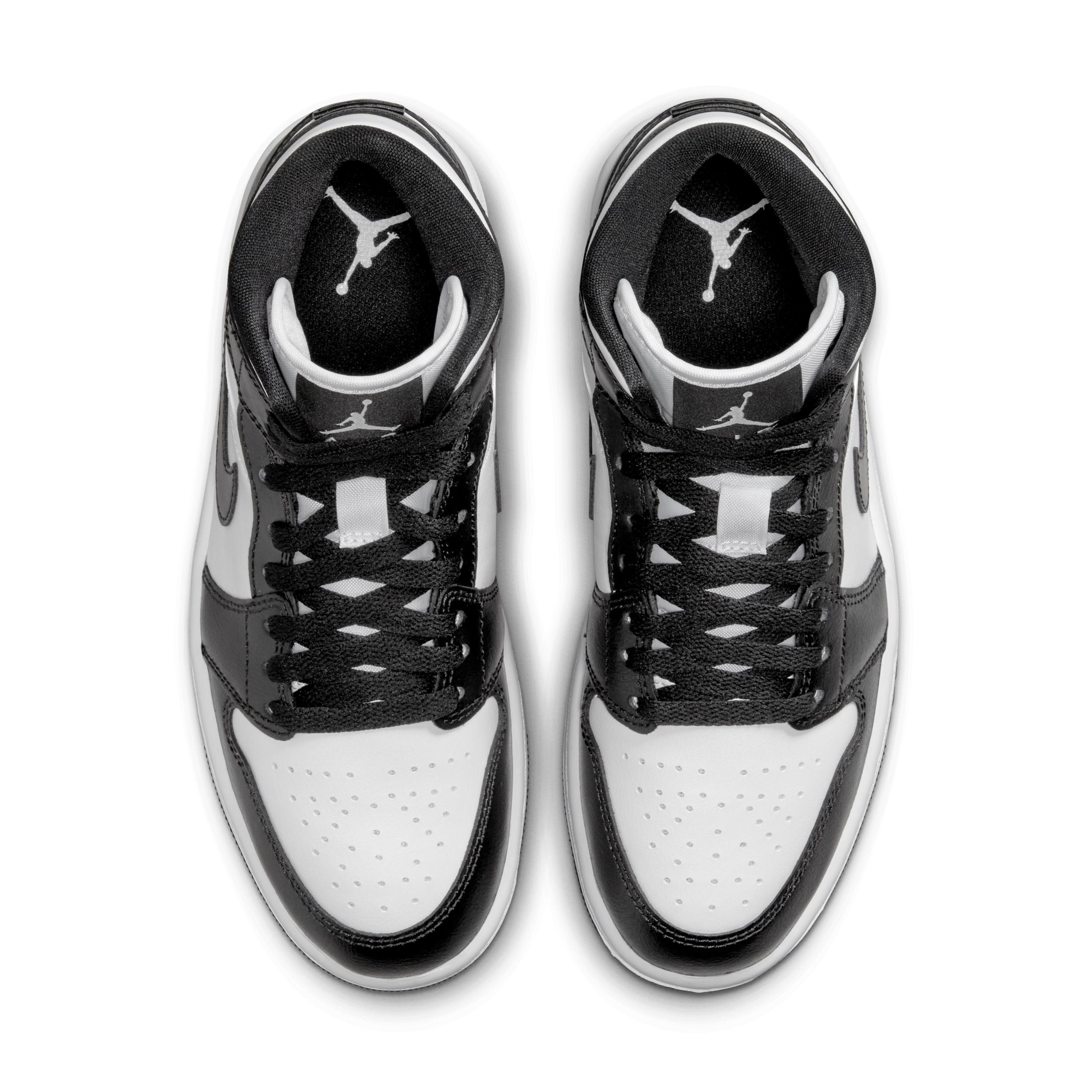 Jordan Air Jordan 1 Mid Sneaker in Black,White. - size 9.5 (also in 10.5, 11, 5, 5.5, 6, 6.5, 7, 7.5, 8, 8.5, 9) Product Image