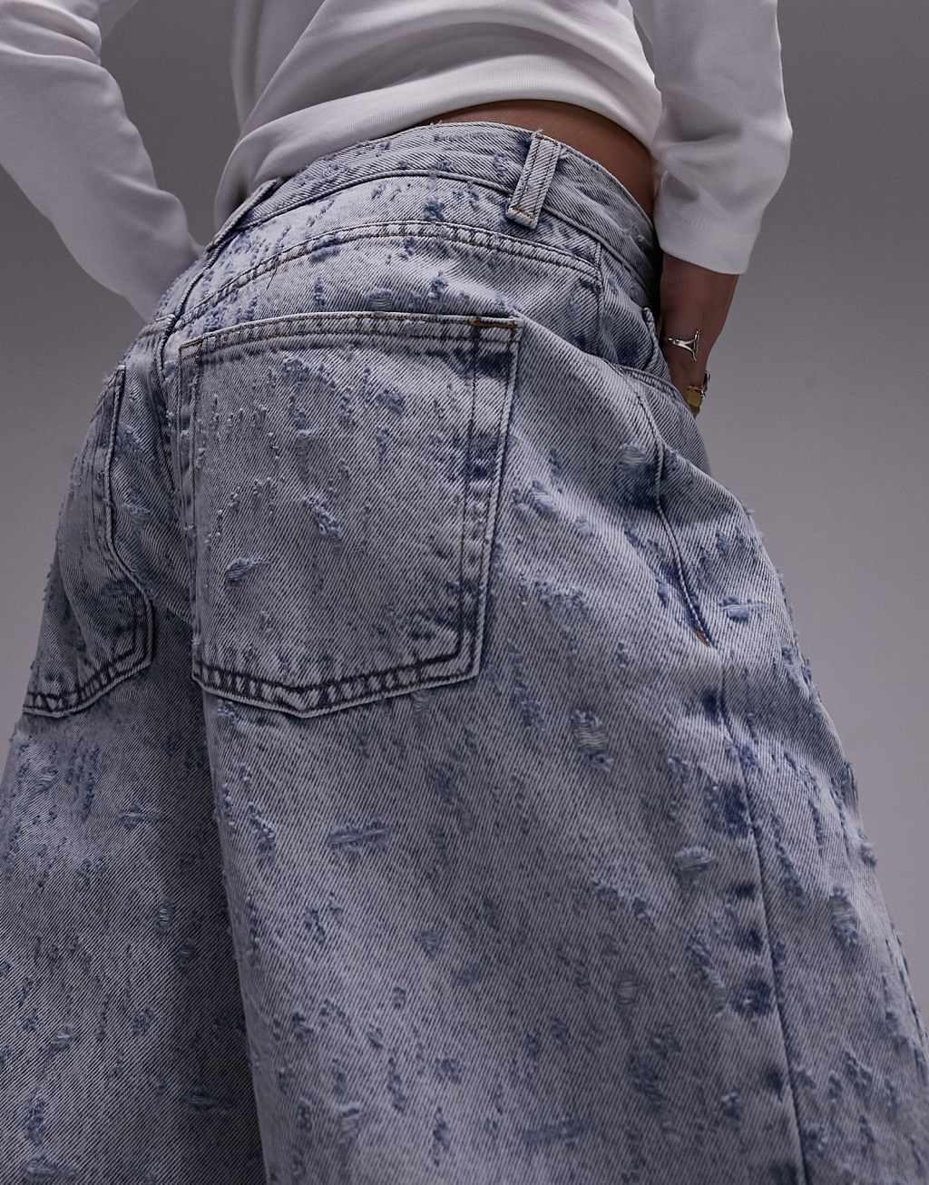 Topshop extreme ripped low-slung boyfriend jeans in bleach Product Image