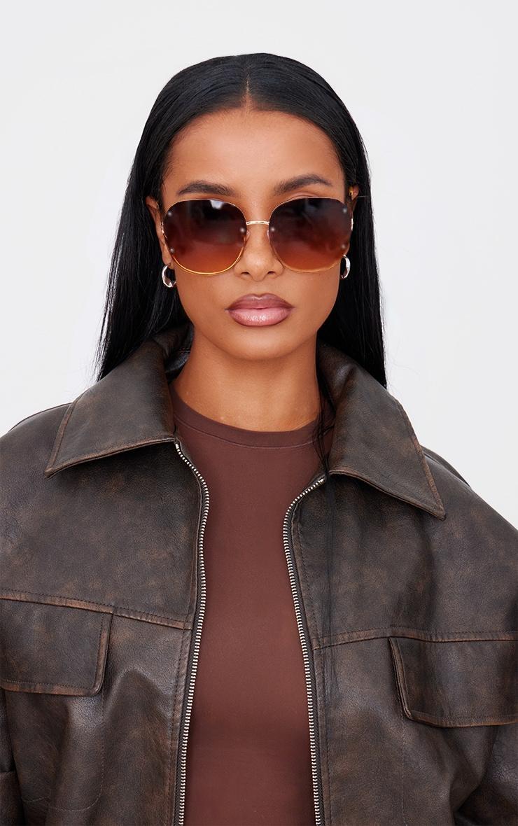 Brown Rimless Oversized Rounded Sunglasses Product Image