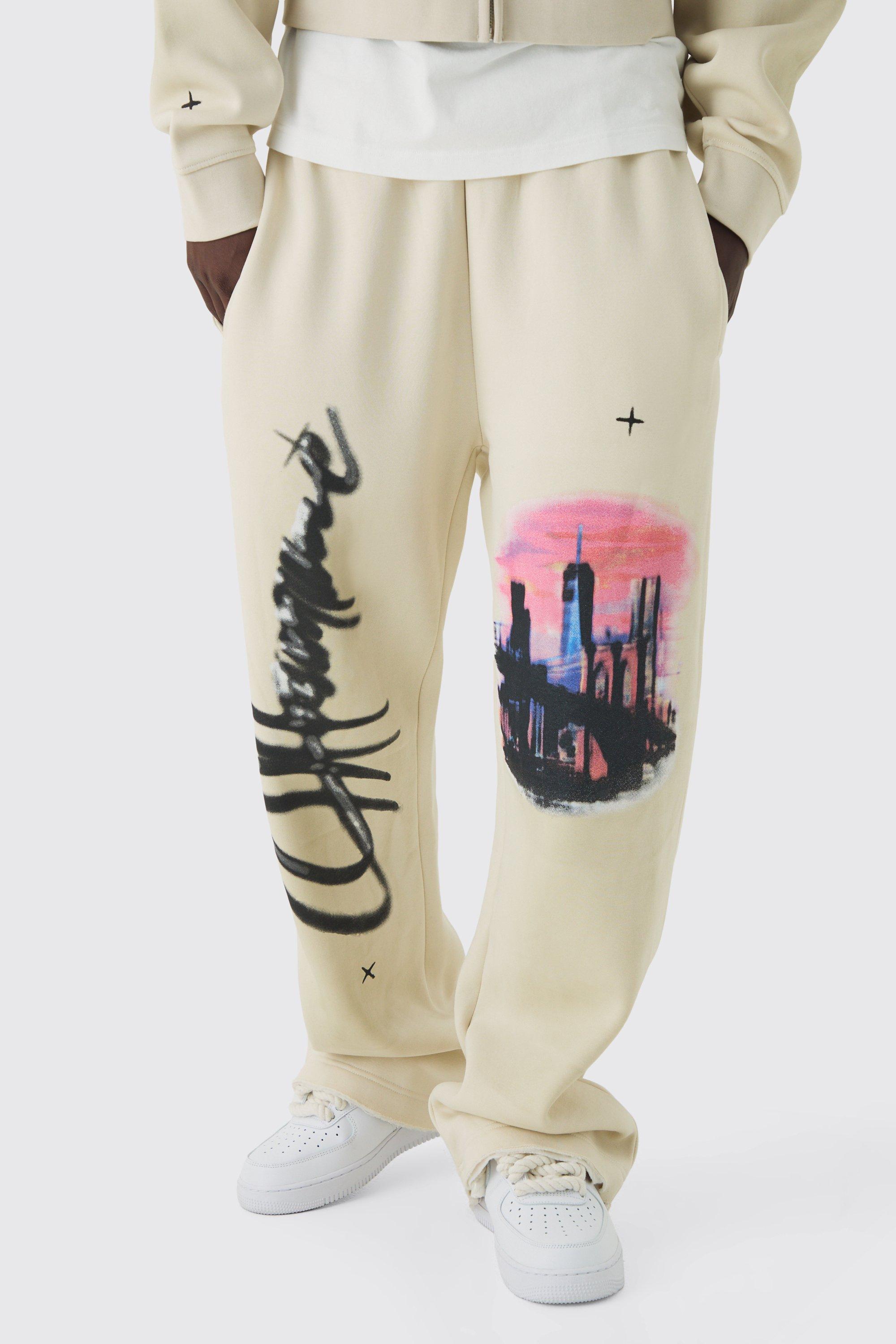 Relaxed Fit Flare Graphic Distressed Brushback Sweatpants | boohooMAN USA Product Image