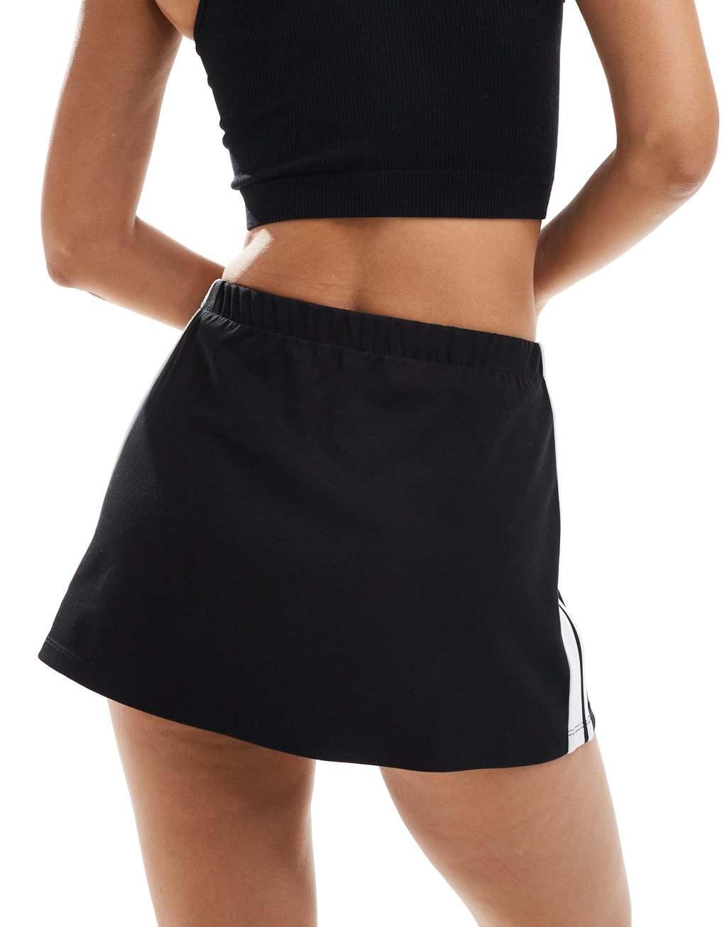 Cotton On sporty jersey mini skirt in black Product Image