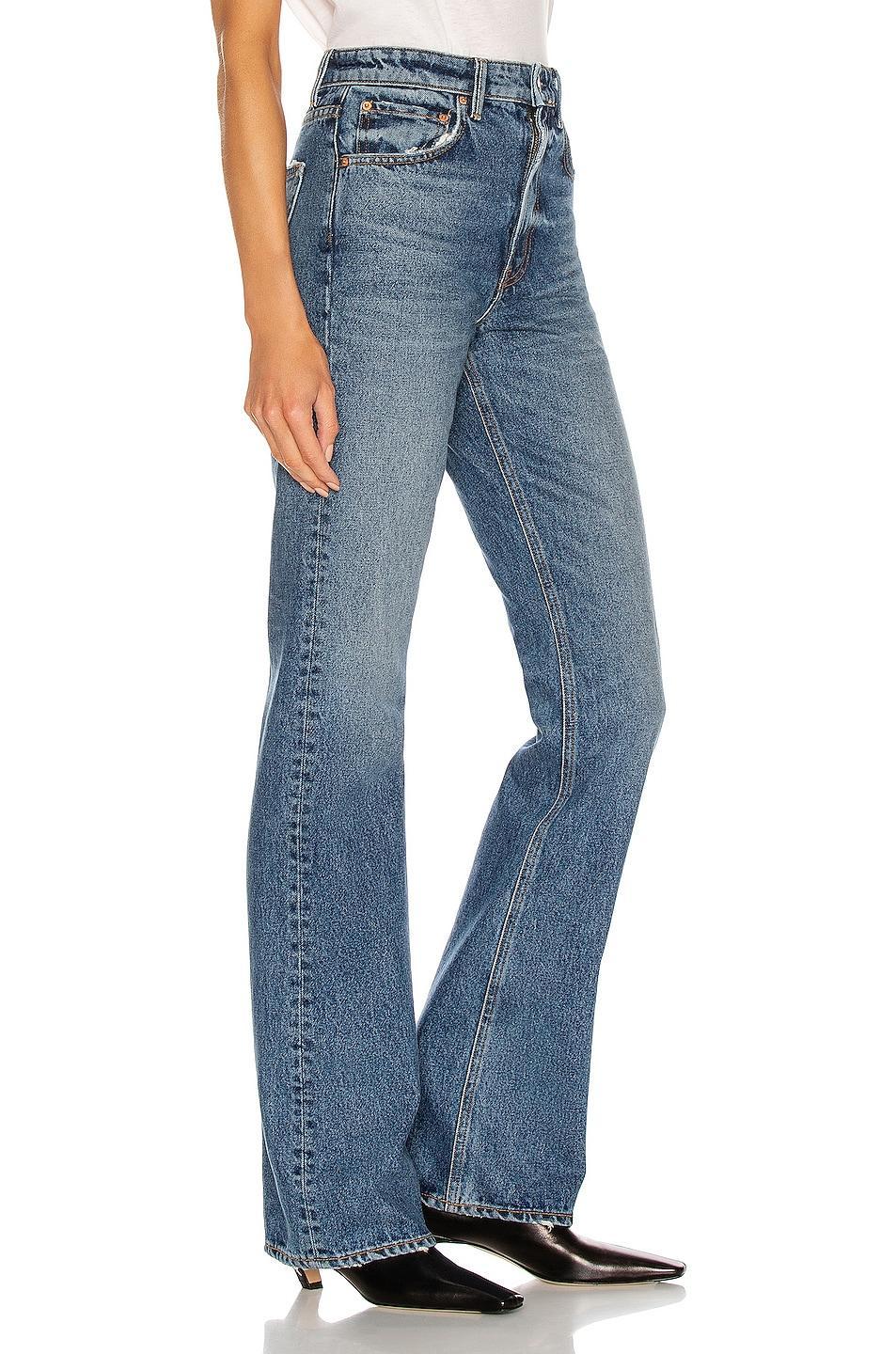 GRLFRND Melanie High Rise Boot Cut in Los Feliz - Denim-Medium. Size 24 (also in 25, 26). Product Image