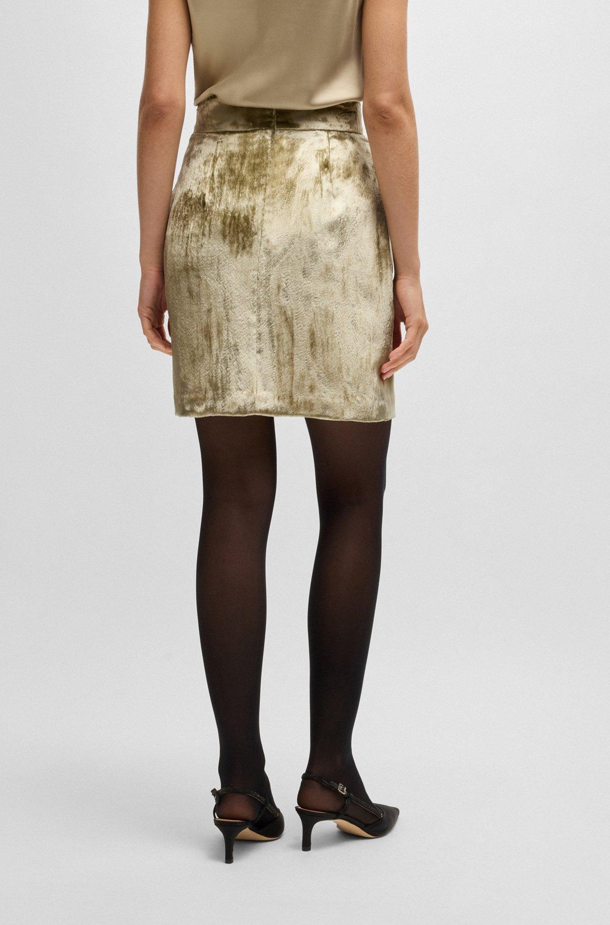 Mini skirt in plush velvet with smooth lining Product Image