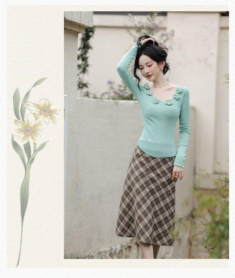 Set: Long-Sleeve Floral Accent Plain Knit Top + High Rise Plaid Midi A-Line Skirt Product Image