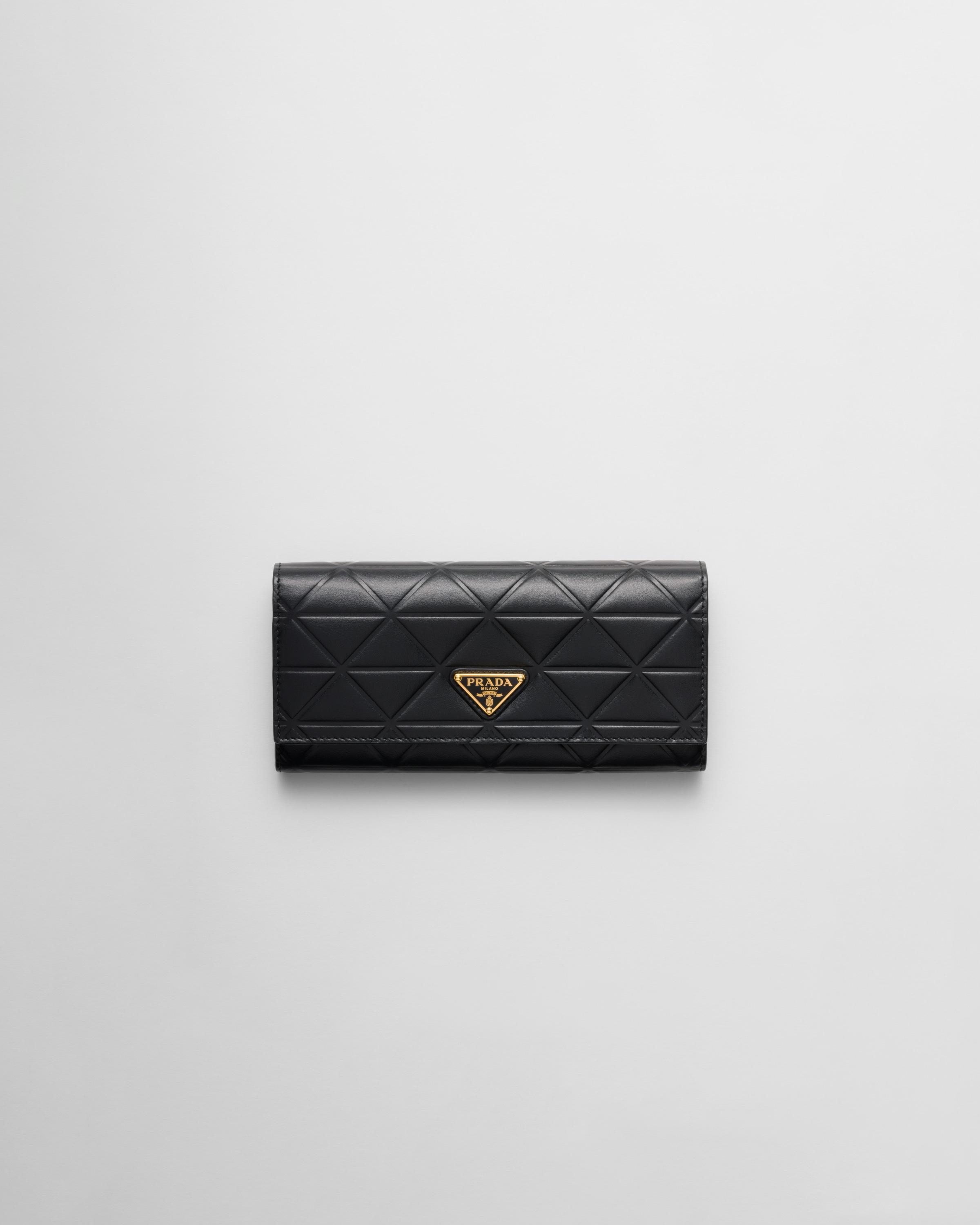 Large leather wallet with triangle motif Product Image