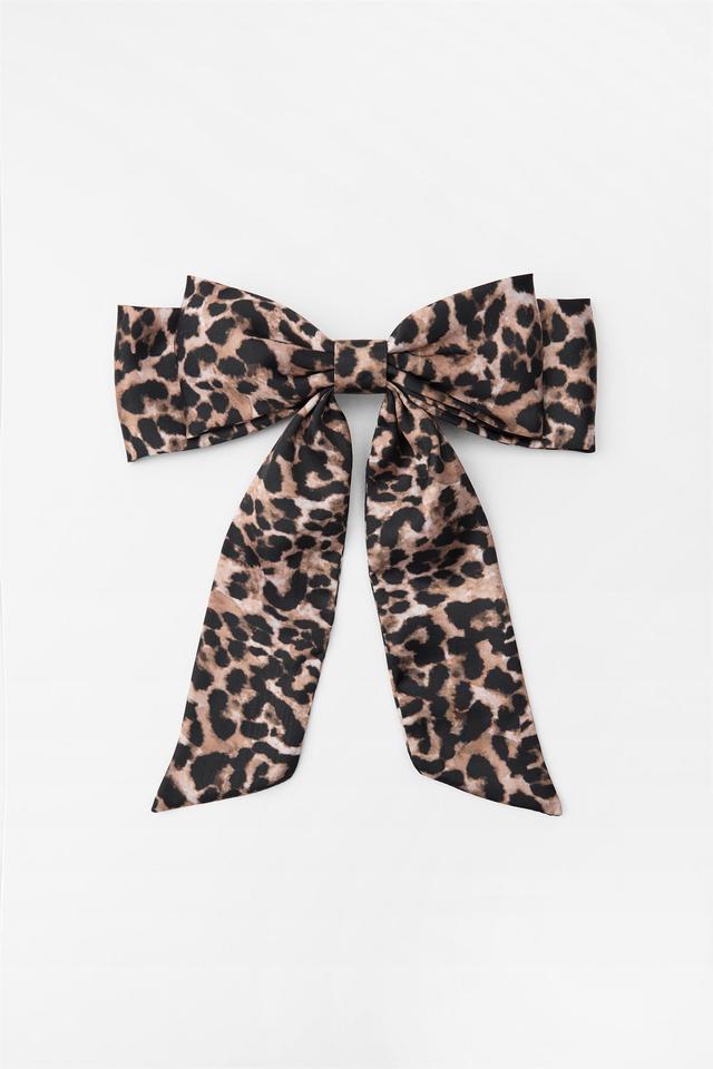 ANIMAL PRINT SATIN EFFECT BOW HAIR CLIP Product Image