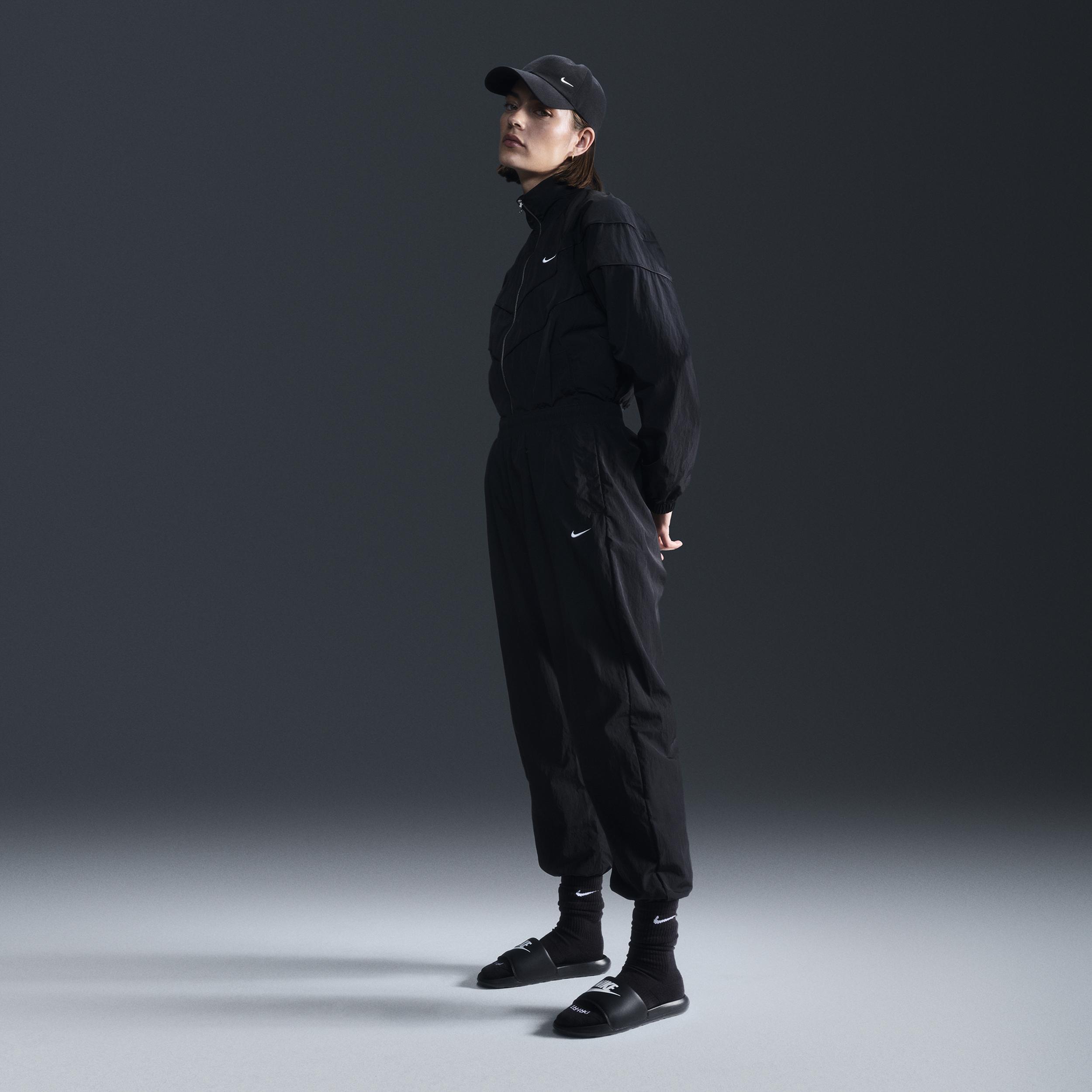 Womens Nike Sportswear Essential Mid-Rise Oversized Woven Jogger Pants Product Image