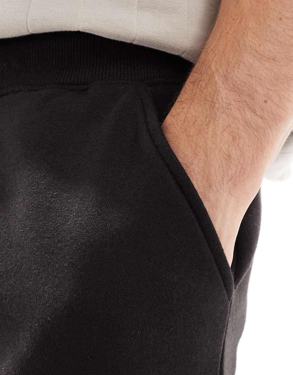 DTT jersey shorts in black Product Image