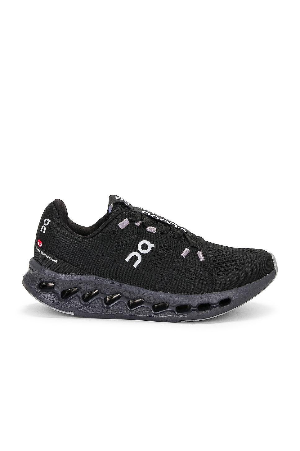 On Cloudsurfer Sneaker in All Black - Black. Size 5.5 (also in ). Product Image